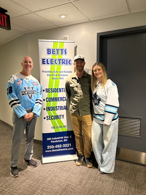Cam Betts of Betts Electric with Tyler and Amanda at the suite